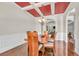 Formal dining room with a coffered ceiling, hardwood floors, and a classic chandelier, ideal for entertaining guests at 271 Learwood Ln, Atlanta, GA 30349
