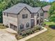 Beautiful two-story brick home featuring an attached two car garage and lovely landscaping at 271 Learwood Ln, Atlanta, GA 30349