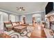 Cozy living room featuring a fireplace, hardwood floors, and a comfortable seating area, perfect for relaxing at 271 Learwood Ln, Atlanta, GA 30349