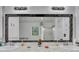 Bathroom featuring double sinks, granite counters, and decorative touches at 3856 Nowlin Nw Rd, Kennesaw, GA 30144