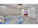 This bedroom features a ceiling fan, two large closets and lots of natural light at 3856 Nowlin Nw Rd, Kennesaw, GA 30144