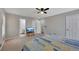 Well lit bedroom with ensuite bath, ceiling fan, carpet and lots of storage at 3856 Nowlin Nw Rd, Kennesaw, GA 30144