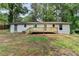 View of the backyard featuring a large deck great for entertaining and a fenced in yard at 396 Independence Dr, Jonesboro, GA 30238