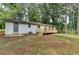 The backyard features a deck and entrance door for added convenience at 396 Independence Dr, Jonesboro, GA 30238