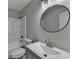 Bathroom features a new vanity, modern fixtures, and a shower-tub combo with a large mirror at 396 Independence Dr, Jonesboro, GA 30238
