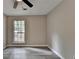 Bedroom features modern floors and a large window that provides lots of natural light at 396 Independence Dr, Jonesboro, GA 30238