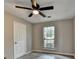 Bedroom features modern floors, neutral walls, and a large window that provides lots of natural light at 396 Independence Dr, Jonesboro, GA 30238