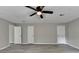 This large bedroom provides ample closet space, neutral walls, and updated floors at 396 Independence Dr, Jonesboro, GA 30238