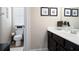 Cozy bathroom featuring a white vanity, toilet, and tile flooring at 2470 Anderson Estates Ct, Marietta, GA 30064