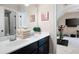 Bathroom features a double sink vanity and access to an exercise room at 2470 Anderson Estates Ct, Marietta, GA 30064