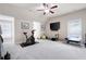 Large exercise room with windows, high ceilings, and a variety of fitness equipment at 2470 Anderson Estates Ct, Marietta, GA 30064