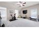 Bright and spacious exercise room equipped with varied workout machines and ceiling fan at 2470 Anderson Estates Ct, Marietta, GA 30064