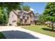 Beautiful home with a long driveway, side entry garage, and a well-kept lawn at 2470 Anderson Estates Ct, Marietta, GA 30064
