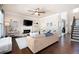 Spacious living room with hardwood floors, fireplace, and view to the staircase at 2470 Anderson Estates Ct, Marietta, GA 30064