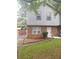 Charming two-story home with brick accents and a neatly manicured lawn at 3530 Hopkins Ct, Powder Springs, GA 30127