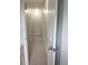 Hallway with beige carpet at 3530 Hopkins Ct, Powder Springs, GA 30127
