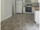 Kitchen features updated appliances and hardwood flooring at 3530 Hopkins Ct, Powder Springs, GA 30127