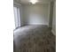 Living room featuring sliding glass doors to the exterior and hardwood floors at 3530 Hopkins Ct, Powder Springs, GA 30127