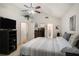 Spacious bedroom featuring vaulted ceiling, ceiling fan, and large windows at 4378 Chestnut Oaks Trce, Lithonia, GA 30038