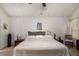 Bright bedroom with ceiling fan, large bed, and neutral decor at 4378 Chestnut Oaks Trce, Lithonia, GA 30038