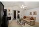 Bright living room features a fireplace, vaulted ceilings, and modern decor at 4378 Chestnut Oaks Trce, Lithonia, GA 30038