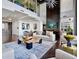 Spacious living room with high ceilings, modern decor, and ample seating at 855 Peachtree Ne St # 1406, Atlanta, GA 30308