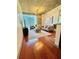 Living room with hardwood floors, neutral decor, and city views at 855 Peachtree Ne St # 1406, Atlanta, GA 30308