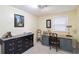 Cozy bedroom featuring an office with ample desk space and storage at 2100 Scarbrough Rd, Stone Mountain, GA 30088
