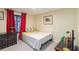 Bright bedroom with ample natural light, colorful bedding, and comfortable furniture at 2100 Scarbrough Rd, Stone Mountain, GA 30088