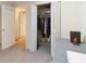 Bedroom featuring a door to the hallway and closet for storage at 2100 Scarbrough Rd, Stone Mountain, GA 30088
