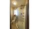 Bathroom with a sliding glass shower, toilet, and window at 3120 Saint Andrews Cir, Duluth, GA 30096