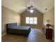 Bedroom featuring a vaulted ceiling, a window, and modern finishes at 3120 Saint Andrews Cir, Duluth, GA 30096
