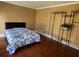 Spacious bedroom with hardwood floors and minimalist decor at 3120 Saint Andrews Cir, Duluth, GA 30096