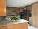 Kitchen featuring granite countertops and stainless steel appliances at 3120 Saint Andrews Cir, Duluth, GA 30096