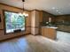 Bright kitchen area with an eat-in dining area and views to the exterior deck at 3120 Saint Andrews Cir, Duluth, GA 30096