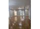 Spacious living room with light gray walls, hardwood flooring, and recessed lighting at 3189 Jackson, Hapeville, GA 30354