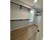 Functional walk-in closet with built-in shelving and ample storage space for organization at 3189 Jackson, Hapeville, GA 30354