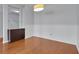 Bright dining room featuring hardwood floors, modern lighting and elegant trim for a welcoming space at 328 Oaktown Ct, Lawrenceville, GA 30044