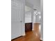 Bright hallway with hardwood floors, built-in shelving and trim highlight the home's appeal at 328 Oaktown Ct, Lawrenceville, GA 30044