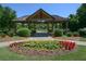A community gazebo is set within a garden and is surrounded by beautiful landscaping in a well-maintained green space at 532 Oakside Pl, Acworth, GA 30102