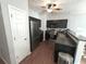 Efficient kitchen with stainless steel appliances, dark cabinets, and sleek countertops at 532 Oakside Pl, Acworth, GA 30102