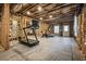 Unfinished basement with workout equipment, offers potential for customization and added living space at 2603 Apple Valley Ne Rd, Brookhaven, GA 30319