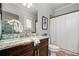Stylish bathroom with granite counters, modern fixtures, and a pristine shower-tub combination at 2603 Apple Valley Ne Rd, Brookhaven, GA 30319