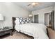 Comfortable bedroom boasts neutral tones, a ceiling fan, and offers a relaxing space at 2603 Apple Valley Ne Rd, Brookhaven, GA 30319