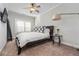 Bright bedroom with natural light, ceiling fan, and comfortable bedding; a tranquil space for relaxation at 2603 Apple Valley Ne Rd, Brookhaven, GA 30319