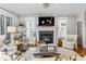 Comfortable living room with fireplace and lots of natural light at 2603 Apple Valley Ne Rd, Brookhaven, GA 30319