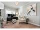 Bright home office with a comfortable armchair, sleek desk setup, stylish artwork, and plenty of space for work at 2603 Apple Valley Ne Rd, Brookhaven, GA 30319