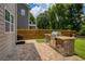 Backyard with patio, outdoor grill, and wooden fence at 4652 Prater Se Way, Smyrna, GA 30080