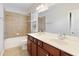 Bathroom showcasing a double sink vanity with a shower and tub at 4652 Prater Se Way, Smyrna, GA 30080