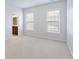 Bedroom with neutral carpet and bathroom access at 4652 Prater Se Way, Smyrna, GA 30080